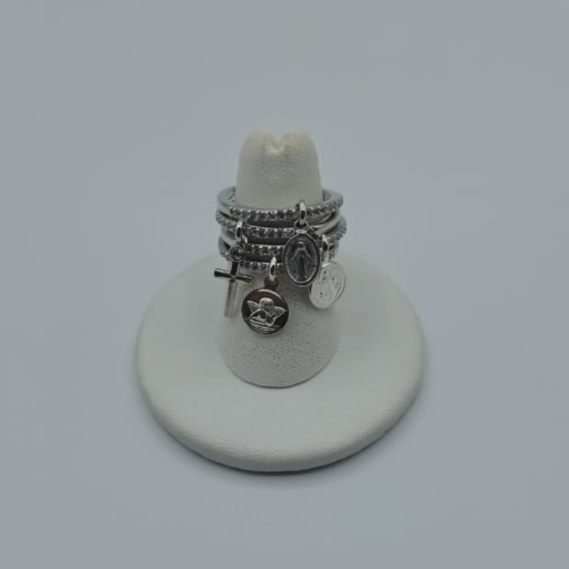 Anillo ajustable circon, dije varios V.M, cruz, angel de la guarda o san benito plateado