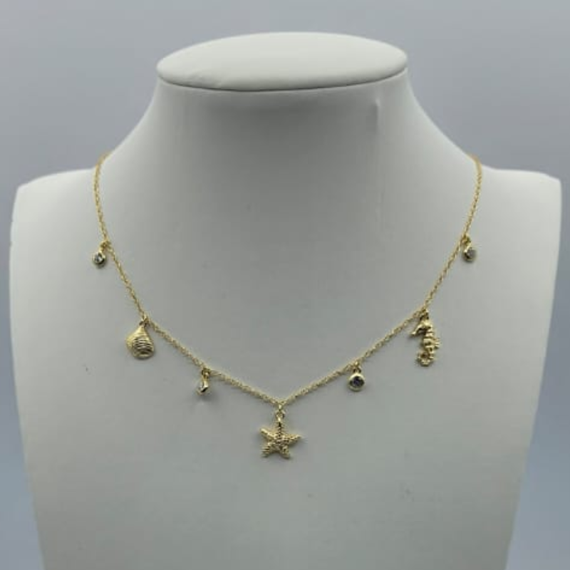 Cadena dijes cristal, caracol, estrella de mar y caballito de mar